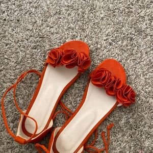 String tied orange sandals